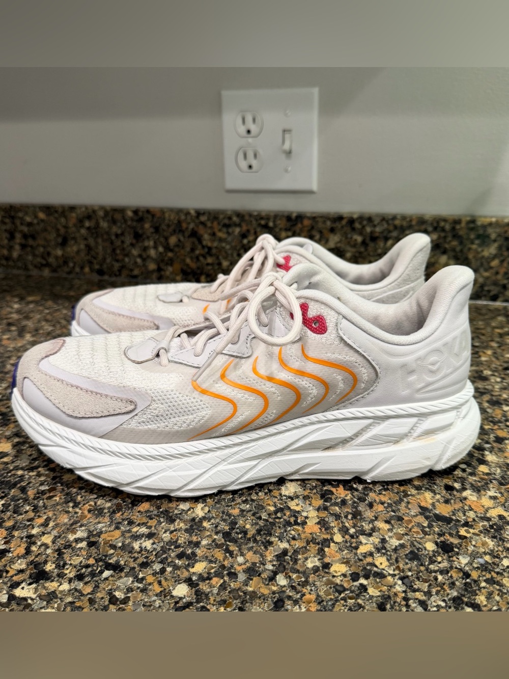 Hoka  Women’s Running Sneakers with Orange Accents size 10
